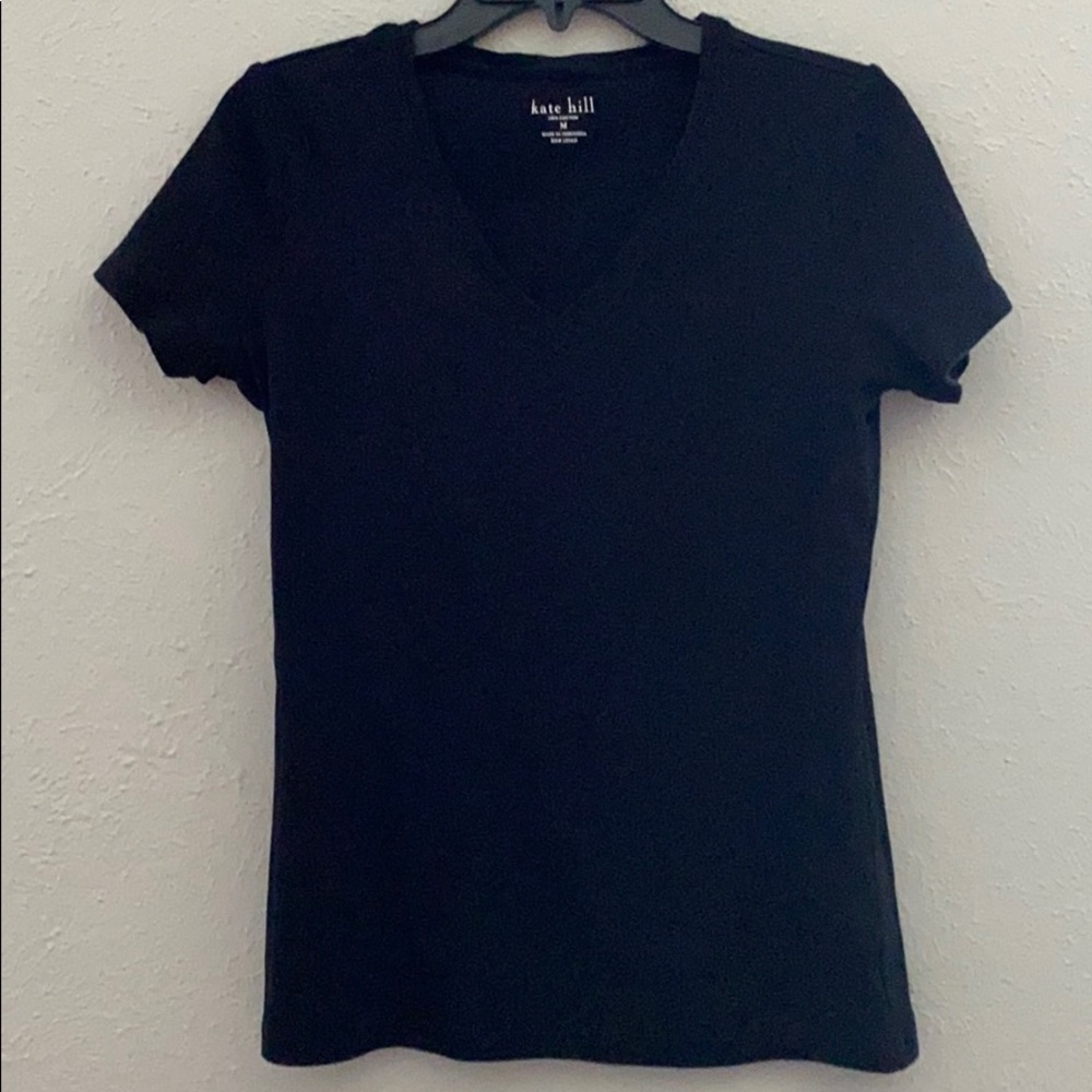Short sleeve hundred percent cotton T-shirt.